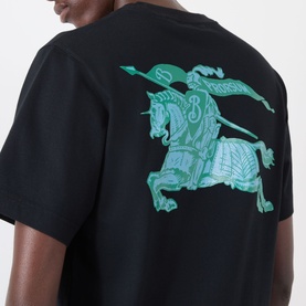 Model wearing Burberry Ryan Big Logo T-Shirt in black, rear view showing large green Equestrian Knight graphic print on back.