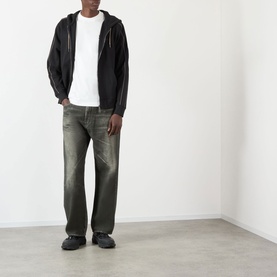 Model wearing Burberry Seth Embroidered Logo T-Shirt in white, styled with dark zip-up hoodie and khaki wide-leg jeans.