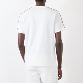 Model wearing Burberry Seth Logo Check T-Shirt in white, rear view, showing signature check piping trim detail at shoulders and sleeves