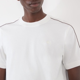 Model wearing Burberry Seth Logo Check T-Shirt in white with signature check piping at shoulders and embroidered Equestrian Knight logo