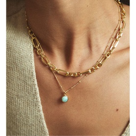 Model with Daisy Jewellery Healing Stone Necklace in 18ct Gold Plate, featuring round turquoise amazonite pendant on adjustable chain, layered styling