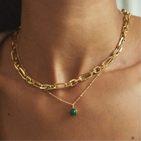 Model with Daisy Jewellery Healing Stone Necklace in 18ct Gold Plate, round green aventurine pendant on bobble chain, layered with gold chunky link
