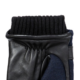 Dents navy and black leather and wool gloves with ribbed knit cuff, close-up detail view