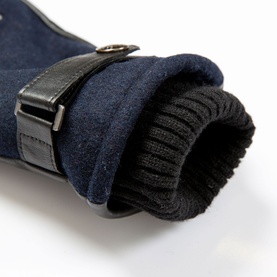 Dents navy and black suede gloves with knitted cuff lining and leather buckle strap detail, close-up view