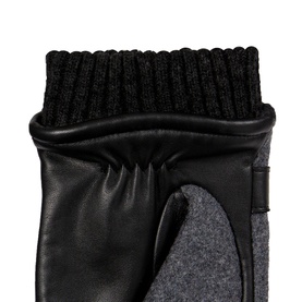 Dents charcoal and black leather gloves with ribbed knit cuff and wool panel detail, close-up view
