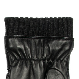 Dents black leather gloves with ribbed knit cuff detail, close-up view showing gathered leather palm