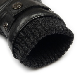 Dents black leather gloves with ribbed knit cuff lining detail, close-up view showing interior fleece lining
