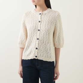 Model wearing InWear Dafne Textured Cardigan in Vanilla, short sleeves, button front, round neck, styled with dark jeans