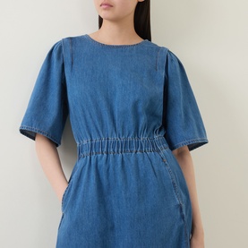 Model wearing InWear Glenn Denim Dress in Faded Blue denim, round neckline, wide short sleeves and elasticated gathered waist