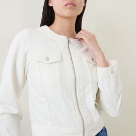 Model wearing InWear Gladys Zip Denim Jacket in Ecru Melange, collarless with front zip, chest flap pockets and long sleeves.