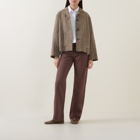 Model wearing InWear Gladys Straight Leg Jeans in Coffee Quartz, straight-cut, styled with a cropped tan jacket and white shirt.