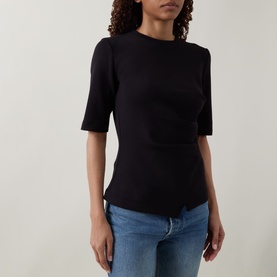 Model wearing InWear Far Vincent Ruched T-Shirt in black with round neckline, short sleeves and ruched front detail, styled with blue jeans.