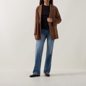 Model wearing InWear Far Vincent Ruched Black T-Shirt, styled with a brown blazer, blue wide-leg jeans and black loafers.