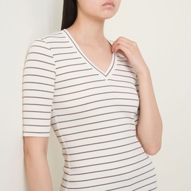Model wearing InWear Dagnal Striped T-Shirt in Vanilla/Coffee Q, featuring a V-neckline, short sleeves, and horizontal stripe pattern.