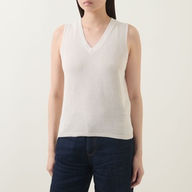 Model wearing InWear Deva Knitted Vest in Ecru, V-neckline, sleeveless knit top with ribbed trims, styled with dark blue jeans.