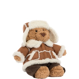 Jellycat plush teddy bear in tan shearling coat and matching aviator hat with cream fleece trim, seated pose