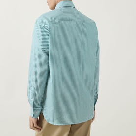 Model wearing Kempt Stripe Single-Cuff Shirt in green and white, back view, showing straight yoke, long sleeves and single cuffs.