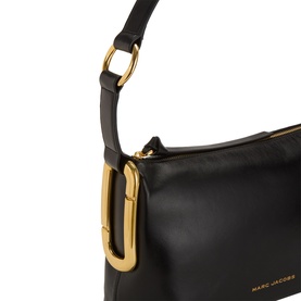 Marc Jacobs Scene Logo Shoulder Bag in black leather, close-up of gold-toned hardware clasp detail and crossbody strap