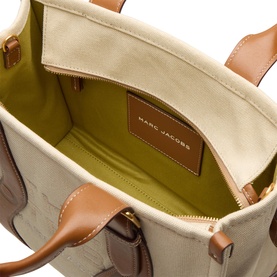 Marc Jacobs The Wavy Canvas Medium Tote Bag in beige, interior view showing olive-green lining, zip pocket and branded patch