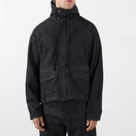 Model wearing Robyn Lynch black denim casual jacket with high collar, press-stud fastening, and large front patch pockets