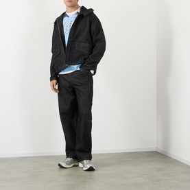 Model wearing Robyn Lynch Black Denim Casual Jacket with matching black trousers, light blue tee and grey trainers