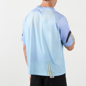 Model wearing Robyn Lynch T-Shirt in Off Black, rear view, showing colour-block panelling and stripe detailing on sleeves