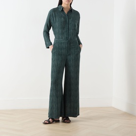 Model wearing Transit Stripe Pocket Shirt in petrol, styled with matching wide-leg stripe trousers and brown leather sandals