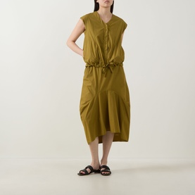 Model wearing Transit olive cotton skirt with drawstring waist, paired with a matching sleeveless top and dark brown sandals