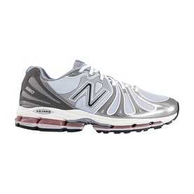 New Balance trainer in dark silver metallic grey, mesh and synthetic upper, chunky white midsole with pink accent, silver overlays