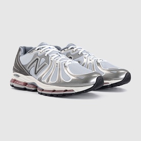 New Balance 1906R trainers in dark silver metallic grey, mesh and metallic upper, chunky white midsole with pink Air unit detail