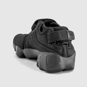 Nike Rift-style sandal trainer in triple black, featuring velcro strap, mesh upper, and black rubber sole, rear view