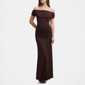 Model wearing Forever New Dark Chocolate off-shoulder ruched maxi dress with fitted corset waist and flared hem