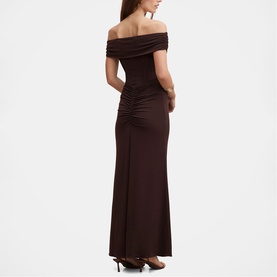 Model wearing Forever New Dark Chocolate off-shoulder ruched maxi dress, shown from the back with fitted silhouette and slight train.