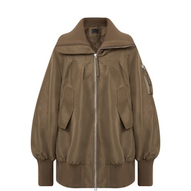 Annette Gortz olive oversized bomber coat with zip front, wide collar, flap pockets and ribbed cuffs