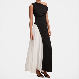 Model wearing Forever New black and white sleeveless maxi dress with asymmetric neckline and pleated contrast skirt panel.