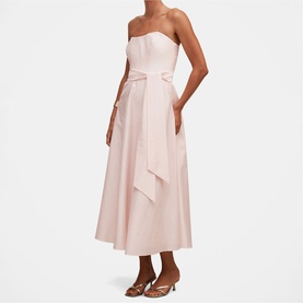 Model wearing Forever New pink strapless midi dress with tie-waist belt and full skirt, styled with nude heeled sandals