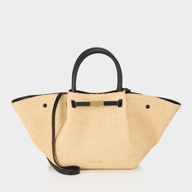 DeMellier The New York Midi Top Handle Bag in warm raffia and black with tubular handles, gold-tone hardware, and detachable crossbody strap