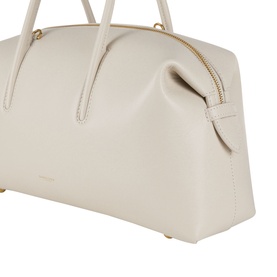 DeMellier The Stockholm Midi Top Handle Bag in Chalk grained leather, gold-plated zip and hardware detail, signature side-tab construction visible