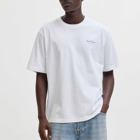 Model wearing Jack & Jones Bright White crew neck T-shirt with small chest script logo, styled with light blue jeans.