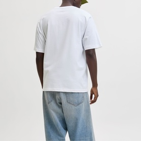 Model wearing white short-sleeve crew-neck T-shirt, styled with light-wash baggy jeans, rear view