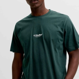 Model wearing Jack & Jones Soho Logo T-Shirt in Scarab green, crew neck with short sleeves and small JJ Studios chest print.