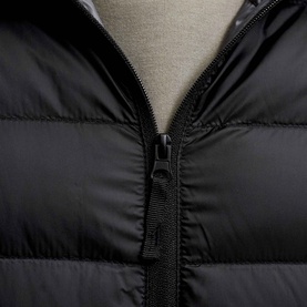 Jack & Jones Berg Padded Hooded Puffer Jacket in black, close-up of front zip fastening and quilted nylon panels