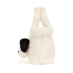 Jellycat white plush bunny bag, rear view showing fluffy white body with black patch detail and upright ears
