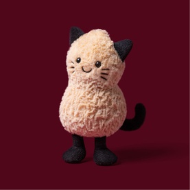 Jellycat Amuseables plush cat toy in cream and black, with textured fur body, black ears, paws and tail, smiling face