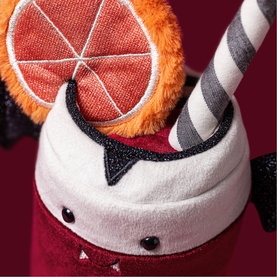 Jellycat Amuseables plush soft toy detail shot showing orange slice and striped straw in a red smoothie cup character, multi-coloured