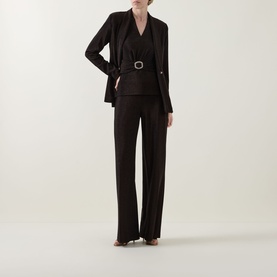 Model wearing Joseph Ribkoff bronze blazer with belt detail, styled with matching wide-leg trousers and a camisole top.