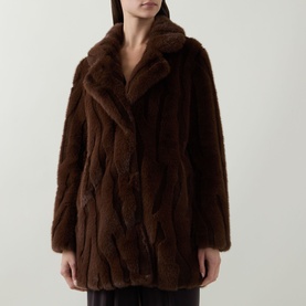 Model wearing Joseph Ribkoff Textured Faux Fur Coat in brown, featuring notch lapel collar and single-breasted longline silhouette