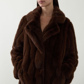Model wearing Joseph Ribkoff Textured Faux Fur Coat in brown, showing notch lapel collar and single-breasted longline silhouette
