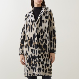 Model wearing Joseph Ribkoff Coat in Camel/Multi leopard print, styled with black polo neck and trousers