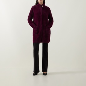 Model wearing Joseph Ribkoff Statement Button Knitted Coat in Elderberry, mock neck, patch pockets, styled with black wide-leg trousers